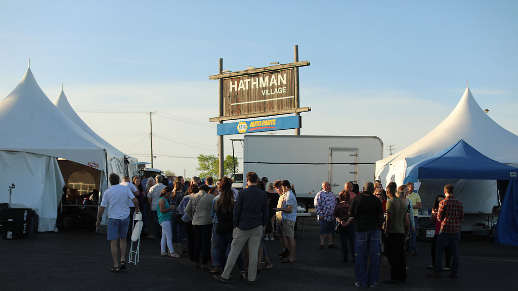 Columbia residents wait in designated lines outside of McLanks